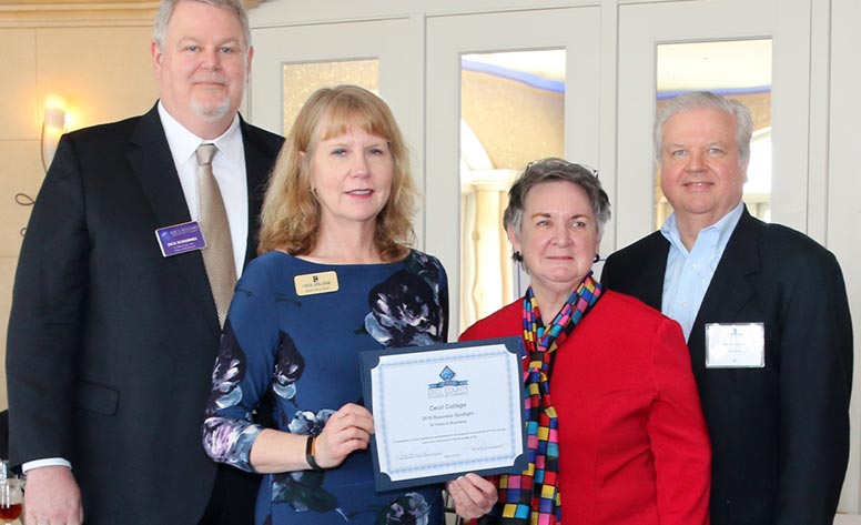 Dr. Mary Way Bolt with the Cecil County Chamber of Commerce President and other local business people