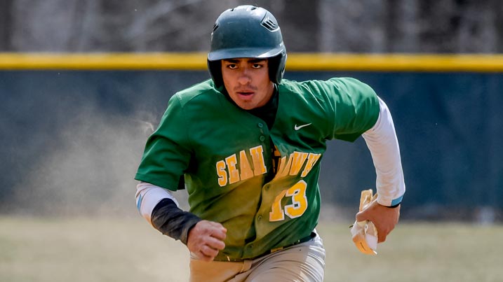 Men's baseball player running