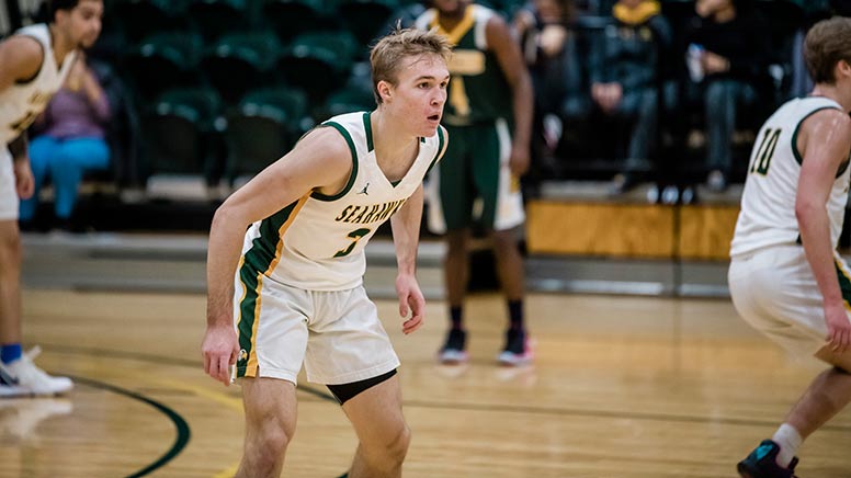 Photo of Jacob Falko on the basketball court.