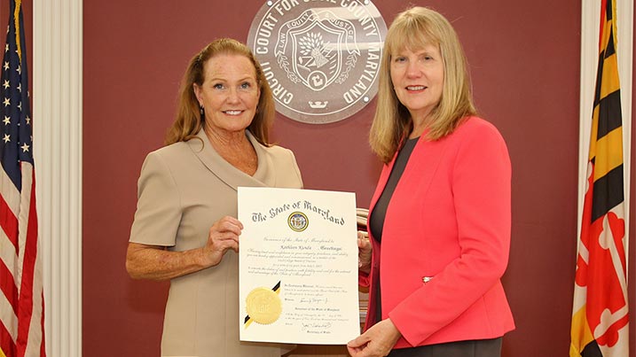 Cecil College Board of Trustee member Kathleen Kunda displays her proclamation along with Cecil College President Dr. Mary Way Bolt.