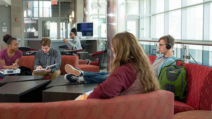 Students relaxing in the EMB lounge area.