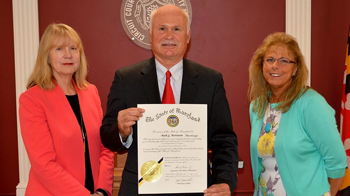 Photograph of Cecil College President Dr. Mary Way Bolt, Cecil College Trustee Mark Mortenson, and Cecil County Clerk of the Court Charlene M. Notarcola.