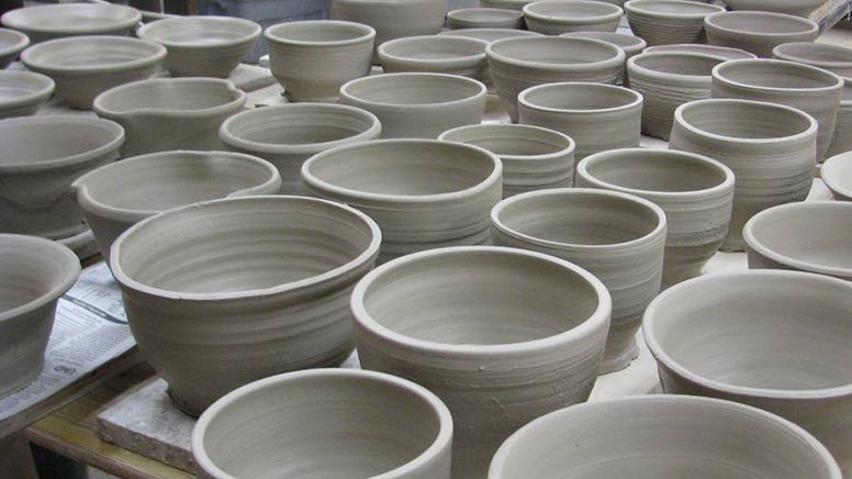 Table of clay bowls from the throw-a-thon