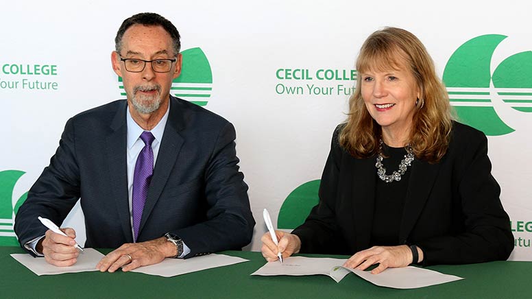 West Chester University President Dr. Christopher M. Fiorentino and Cecil College President Dr. Mary Way Bolt sign a new articulation agreement that allows a smooth transition for students who graduate from Cecil College’s Early College Academy (ECA) program to complete a four-year degree at West Chester University.