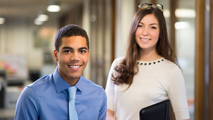 A man and woman in an office.