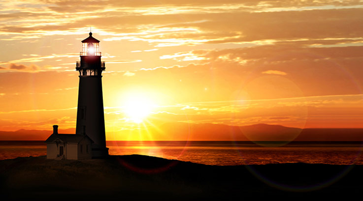 Lighthouse with a sunset behind it.