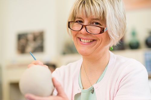 A student working on a sculpture.