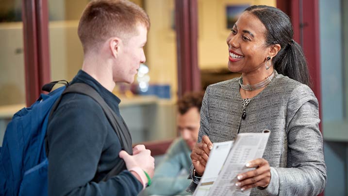 Advisor talking to a student.