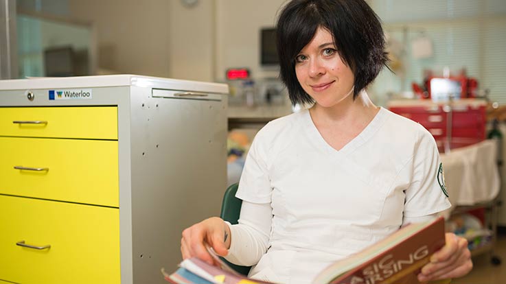 nursing student reading book