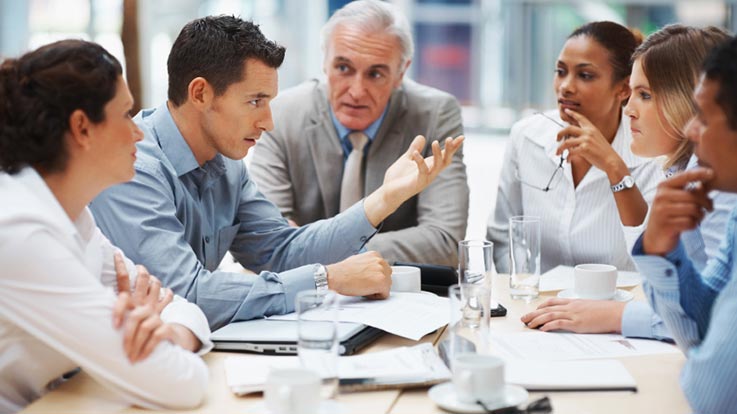 Office workers in a meeting.