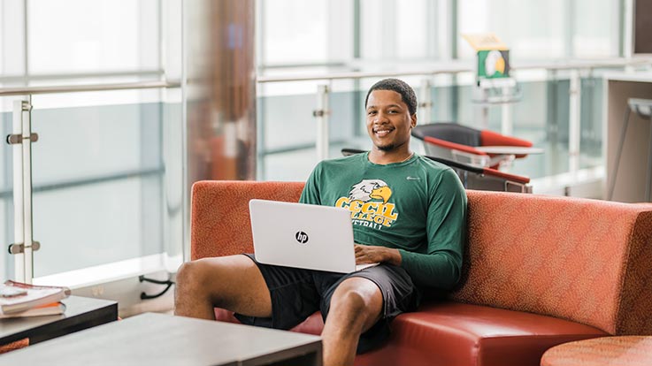 A student using his laptop.