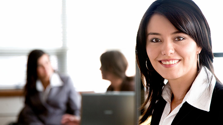 A businesswoman in an office.